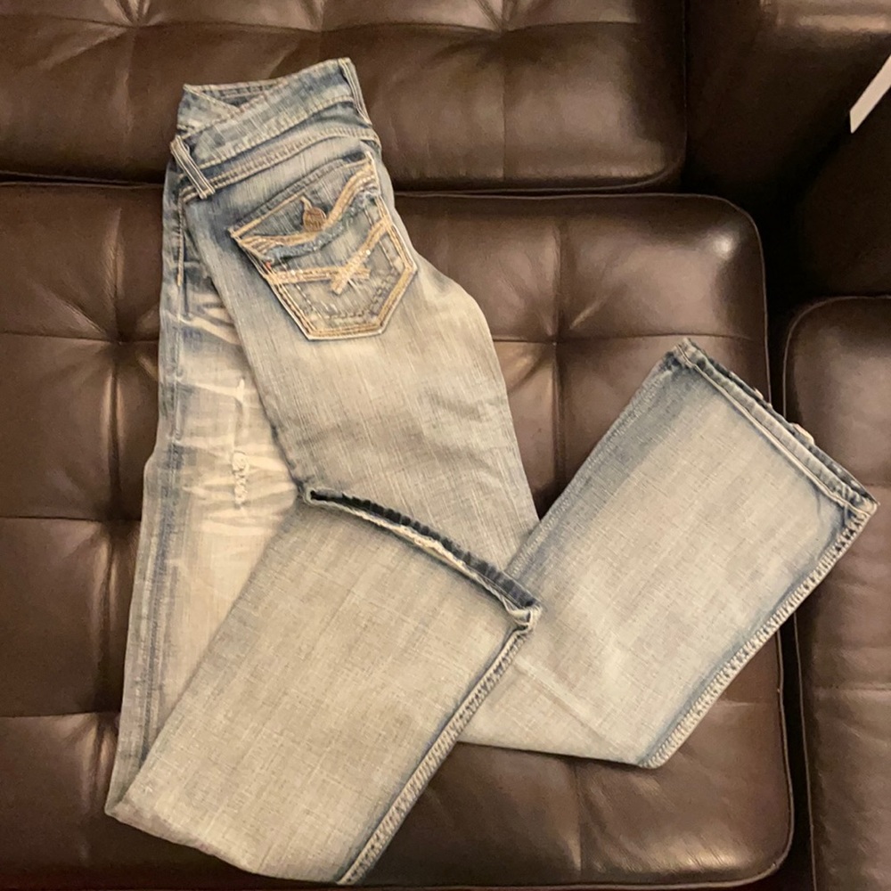 Distressed, low rise jeans